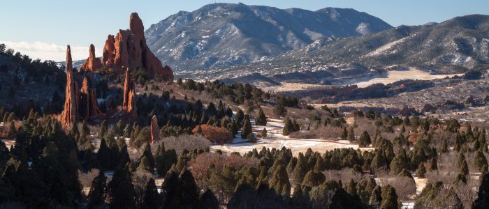 Cathedral Spires, Three Graces and Sleeping Giant rocks in Garden of the Gods, with Cheyenne Mountain in the background. Colorado Springs, Colorado