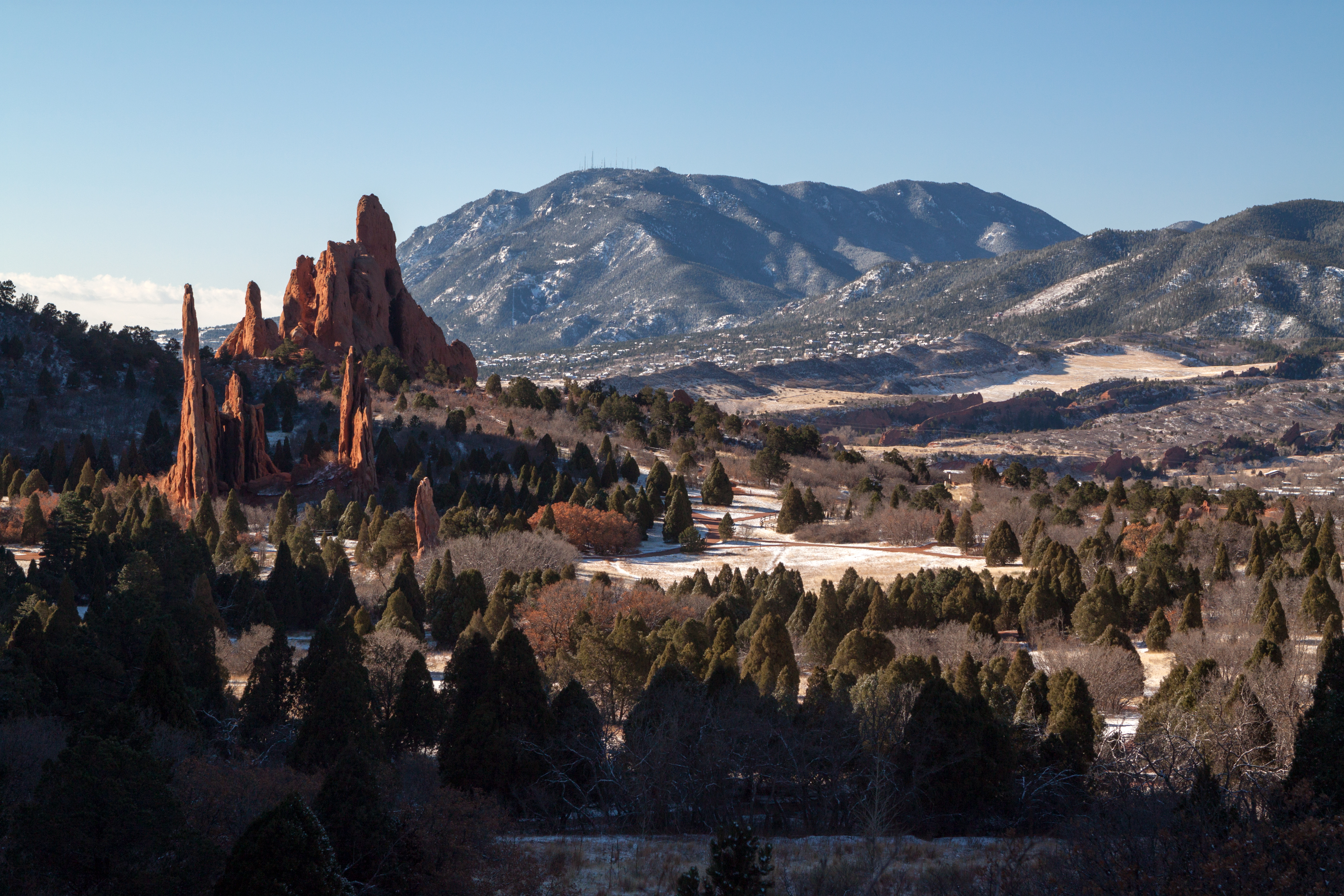 Cathedral Spires, Three Graces and Sleeping Giant rocks in Garden of the Gods, with Cheyenne Mountain in the background. Colorado Springs, Colorado