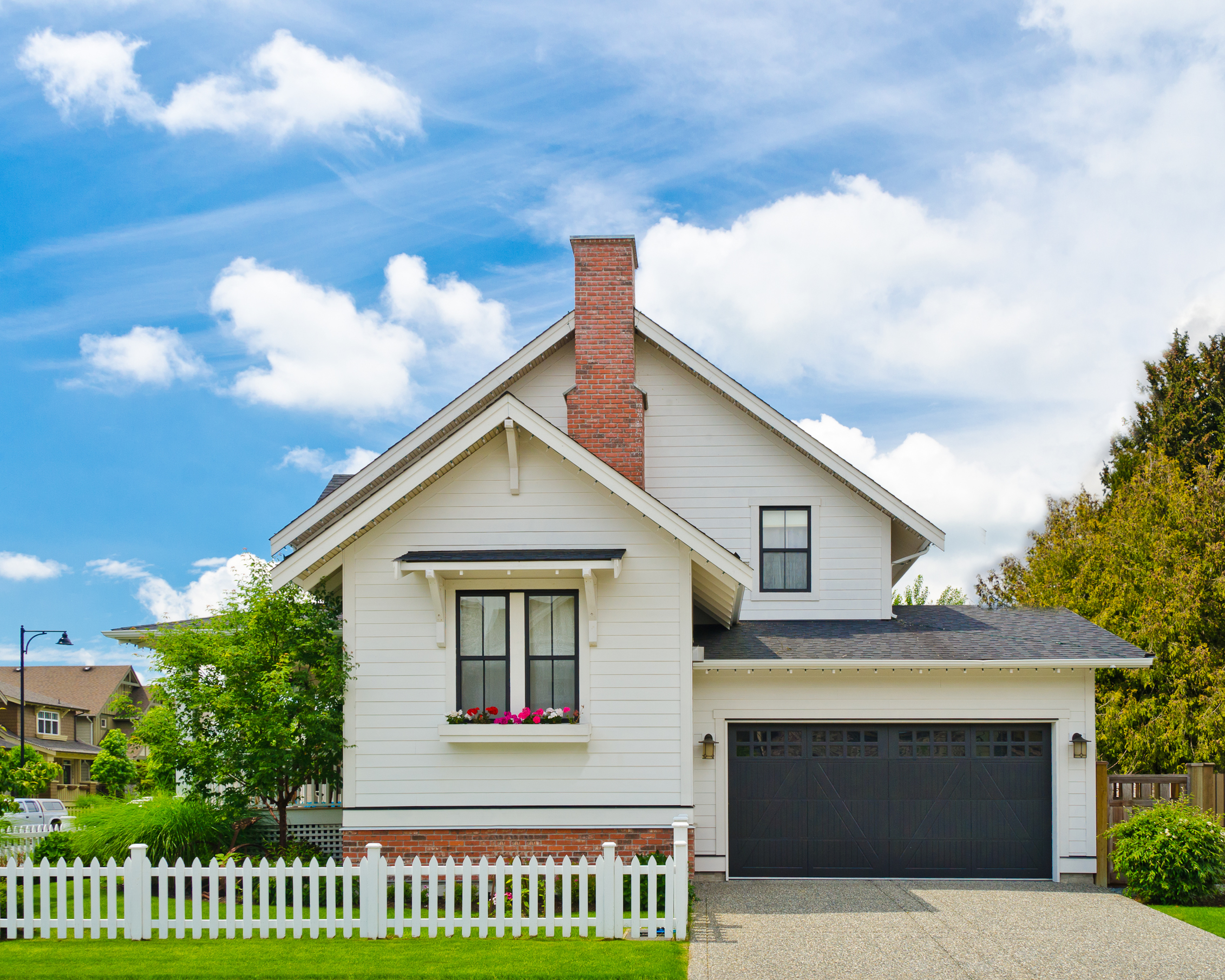 Home on a summer day with a bright blue sky.