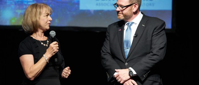 Justin Knoll on stage at the Inaugural Dinner