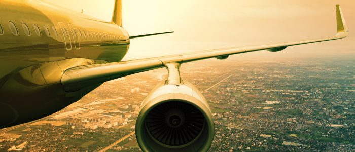 passenger jet plane flyin above cloud scape use for aircraft transportation and traveling business background