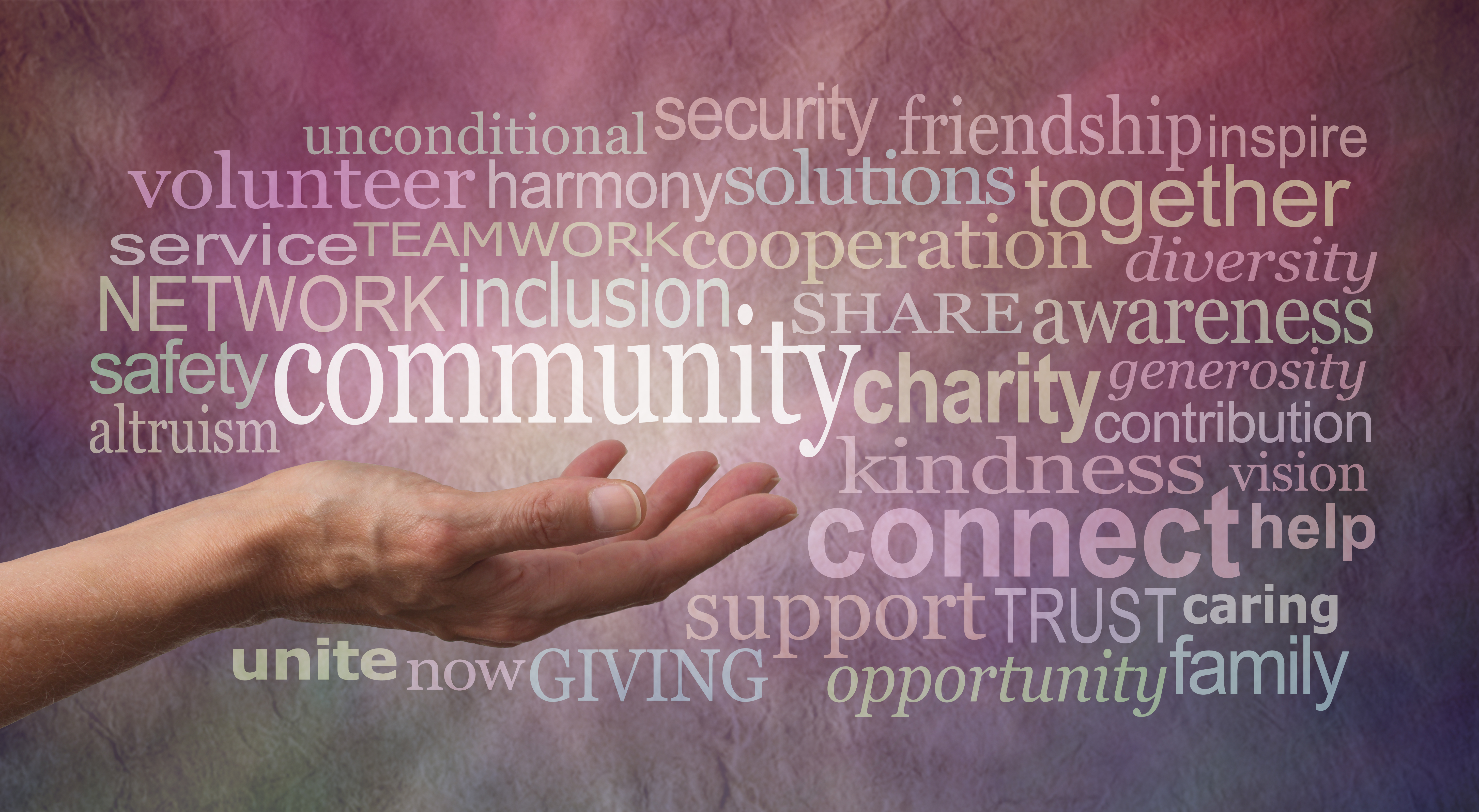 Get involved with your Community Word Tag Cloud - Female open palm hand against rustic stone effect burgundy purple background with the word COMMUNITY floating above surrounded by a word tag cloud