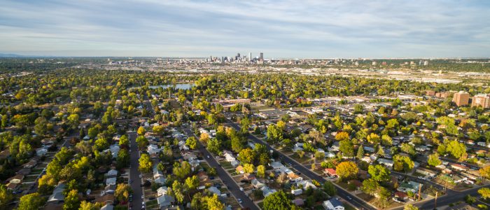 Aerial view of residential neighborhood with view of downtown Denver.