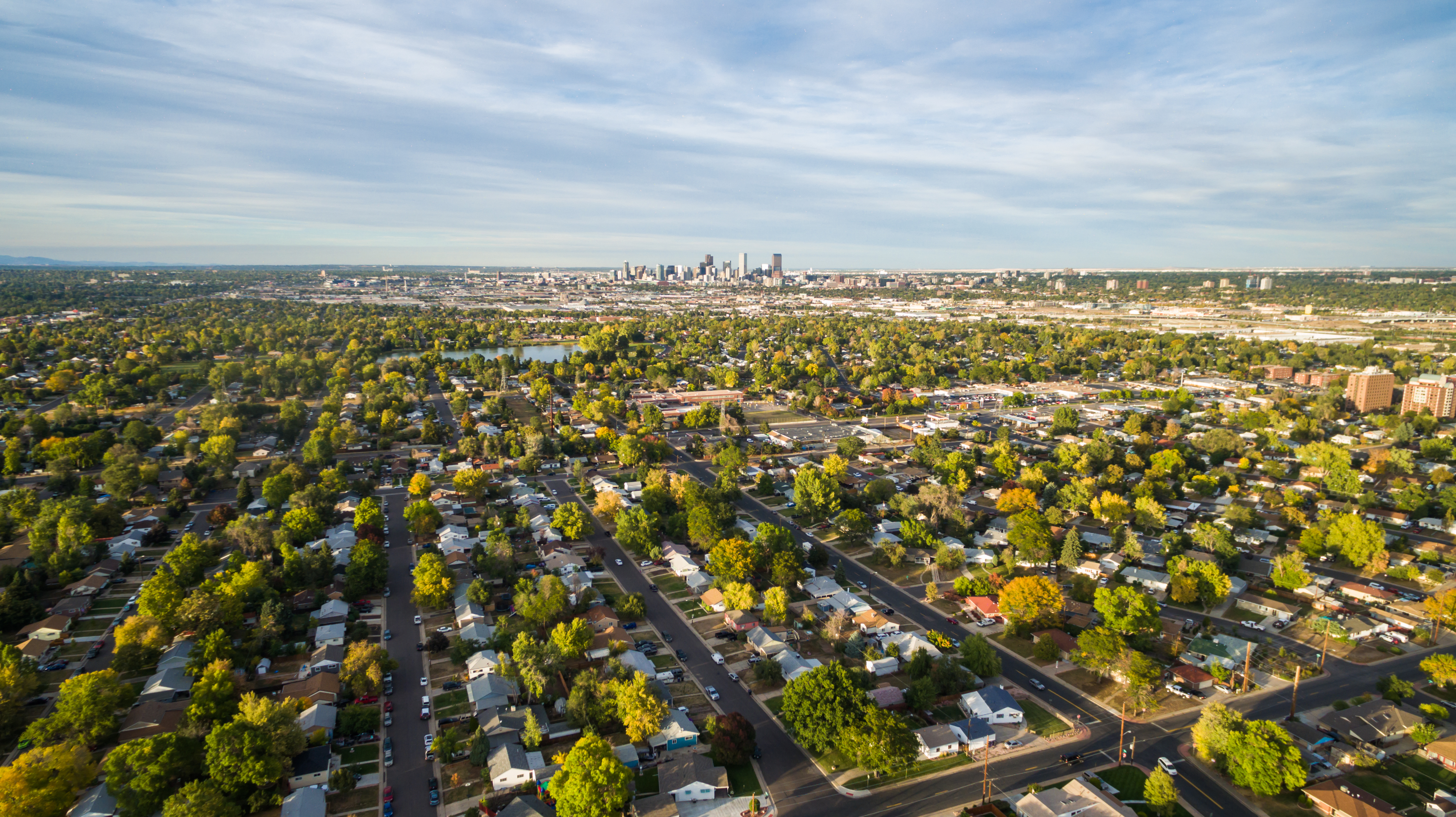Aerial view of residential neighborhood with view of downtown Denver.