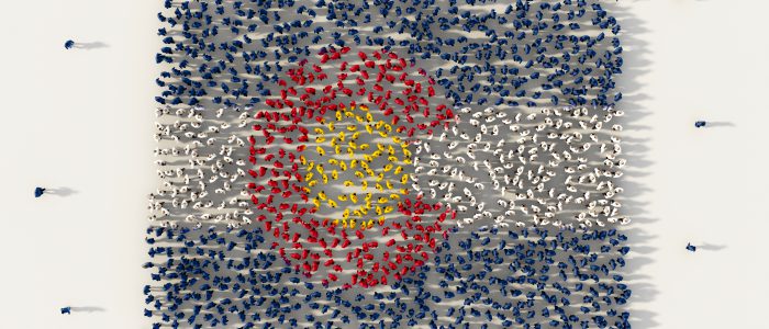 Large group of people forming Colorado flag map in The United States of America, USA, in social media and community concept on white background. 3d sign symbol of crowd illustration from above