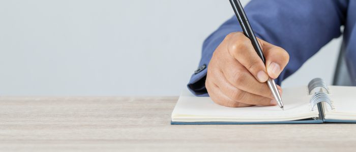 Adult student university study in class and hand note lecture in open notebook for exam. Adults education is practice in engage systematic, sustained self-educating activities in new knowledge skills